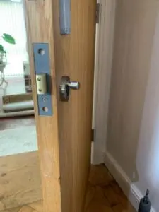 FITTED NEW EURO DEADLOCK AND EURO CYLINDER ON WOODEN DOOR